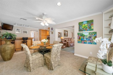This updated home offers one of the most stunning views in all on Highland Lakes Executive Golf Course in Florida - for sale on GolfHomes.com, golf home, golf lot