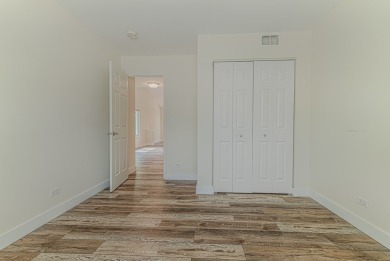 Absolutely beautiful Woodland Green end unit ranch with sunny on Fox Lake Country Club, Inc. in Illinois - for sale on GolfHomes.com, golf home, golf lot
