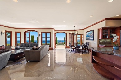 Indulge in elegant coastal living at this opulent ocean-view on Pelican Hill Golf Club in California - for sale on GolfHomes.com, golf home, golf lot