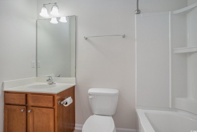 This is a beautifully maintained 2-bedroom, 2-bathroom condo on Barefoot Resort and Golf Club  in South Carolina - for sale on GolfHomes.com, golf home, golf lot