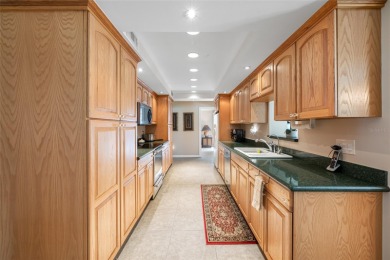 This updated home offers one of the most stunning views in all on Highland Lakes Executive Golf Course in Florida - for sale on GolfHomes.com, golf home, golf lot