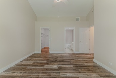 Absolutely beautiful Woodland Green end unit ranch with sunny on Fox Lake Country Club, Inc. in Illinois - for sale on GolfHomes.com, golf home, golf lot