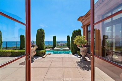 Indulge in elegant coastal living at this opulent ocean-view on Pelican Hill Golf Club in California - for sale on GolfHomes.com, golf home, golf lot