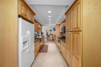 This updated home offers one of the most stunning views in all on Highland Lakes Executive Golf Course in Florida - for sale on GolfHomes.com, golf home, golf lot