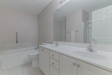 Absolutely beautiful Woodland Green end unit ranch with sunny on Fox Lake Country Club, Inc. in Illinois - for sale on GolfHomes.com, golf home, golf lot
