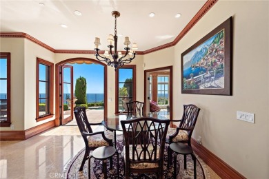 Indulge in elegant coastal living at this opulent ocean-view on Pelican Hill Golf Club in California - for sale on GolfHomes.com, golf home, golf lot