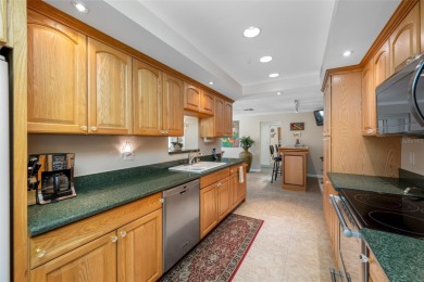 This updated home offers one of the most stunning views in all on Highland Lakes Executive Golf Course in Florida - for sale on GolfHomes.com, golf home, golf lot