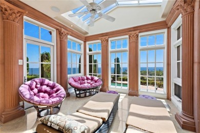 Indulge in elegant coastal living at this opulent ocean-view on Pelican Hill Golf Club in California - for sale on GolfHomes.com, golf home, golf lot