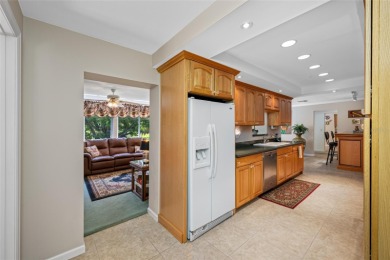 This updated home offers one of the most stunning views in all on Highland Lakes Executive Golf Course in Florida - for sale on GolfHomes.com, golf home, golf lot