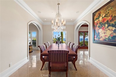 Indulge in elegant coastal living at this opulent ocean-view on Pelican Hill Golf Club in California - for sale on GolfHomes.com, golf home, golf lot