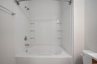 This is a beautifully maintained 2-bedroom, 2-bathroom condo on Barefoot Resort and Golf Club  in South Carolina - for sale on GolfHomes.com, golf home, golf lot