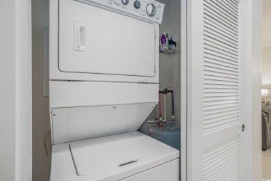 This is a beautifully maintained 2-bedroom, 2-bathroom condo on Barefoot Resort and Golf Club  in South Carolina - for sale on GolfHomes.com, golf home, golf lot