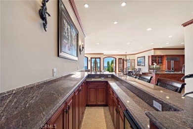 Indulge in elegant coastal living at this opulent ocean-view on Pelican Hill Golf Club in California - for sale on GolfHomes.com, golf home, golf lot