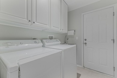 Absolutely beautiful Woodland Green end unit ranch with sunny on Fox Lake Country Club, Inc. in Illinois - for sale on GolfHomes.com, golf home, golf lot