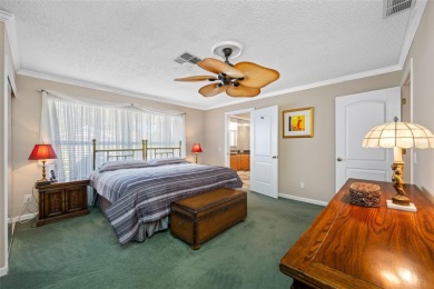 This updated home offers one of the most stunning views in all on Highland Lakes Executive Golf Course in Florida - for sale on GolfHomes.com, golf home, golf lot