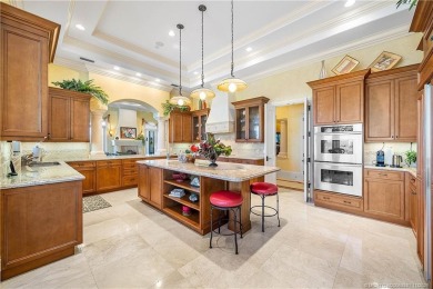 Water, water everywhere! This stunning Sailfish Point residence on Sailfish Point Golf Club, Inc. in Florida - for sale on GolfHomes.com, golf home, golf lot