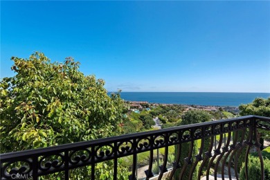 Indulge in elegant coastal living at this opulent ocean-view on Pelican Hill Golf Club in California - for sale on GolfHomes.com, golf home, golf lot