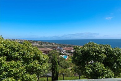 Indulge in elegant coastal living at this opulent ocean-view on Pelican Hill Golf Club in California - for sale on GolfHomes.com, golf home, golf lot