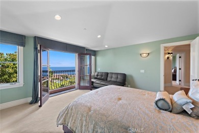 Indulge in elegant coastal living at this opulent ocean-view on Pelican Hill Golf Club in California - for sale on GolfHomes.com, golf home, golf lot