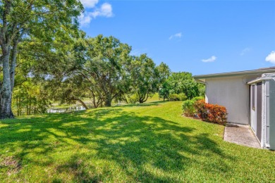 This updated home offers one of the most stunning views in all on Highland Lakes Executive Golf Course in Florida - for sale on GolfHomes.com, golf home, golf lot