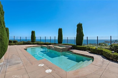 Indulge in elegant coastal living at this opulent ocean-view on Pelican Hill Golf Club in California - for sale on GolfHomes.com, golf home, golf lot