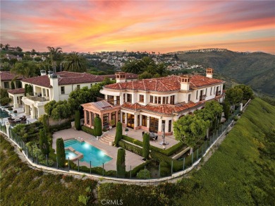 Indulge in elegant coastal living at this opulent ocean-view on Pelican Hill Golf Club in California - for sale on GolfHomes.com, golf home, golf lot