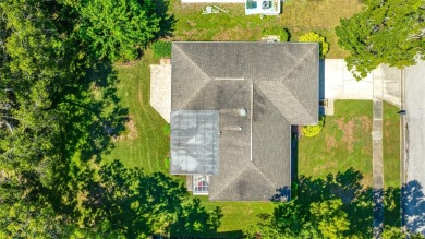 This updated home offers one of the most stunning views in all on Highland Lakes Executive Golf Course in Florida - for sale on GolfHomes.com, golf home, golf lot