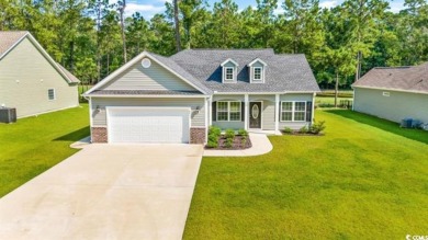 Welcome home to this 3 bedroom 2 bathroom home located in the on Woodland Valley Country Club in South Carolina - for sale on GolfHomes.com, golf home, golf lot