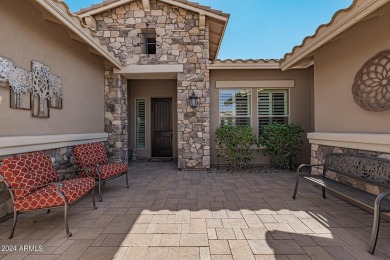 Luxury meets tranquility in this stunning David Weekley home on Estrella Mountain Ranch Golf Course in Arizona - for sale on GolfHomes.com, golf home, golf lot