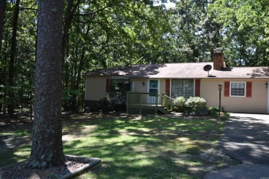 Quaint and quite home on a beautiful street in Fairfield Bay! on Mountain Ranch Golf Club in Arkansas - for sale on GolfHomes.com, golf home, golf lot
