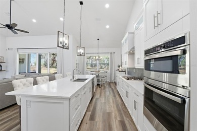 Completed in 2024 and masterfully enhanced with over $50,000 in on Southern Hills Plantation Club in Florida - for sale on GolfHomes.com, golf home, golf lot