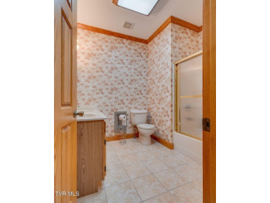This beautifully crafted one-owner estate sits on 1.08 acres on Country Club of Bristol in Tennessee - for sale on GolfHomes.com, golf home, golf lot