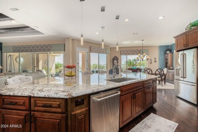 Luxury meets tranquility in this stunning David Weekley home on Estrella Mountain Ranch Golf Course in Arizona - for sale on GolfHomes.com, golf home, golf lot