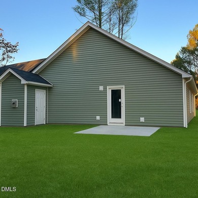 Welcome home to this charming three-bedroom, two-bath ranch on River Golf and Country Club at Lake Royale in North Carolina - for sale on GolfHomes.com, golf home, golf lot