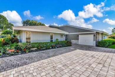 This stunning home boasts a bright and expansive great room with on Eastpointe Country Club in Florida - for sale on GolfHomes.com, golf home, golf lot