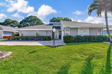 This stunning home boasts a bright and expansive great room with on Eastpointe Country Club in Florida - for sale on GolfHomes.com, golf home, golf lot