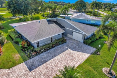 This stunning home boasts a bright and expansive great room with on Eastpointe Country Club in Florida - for sale on GolfHomes.com, golf home, golf lot