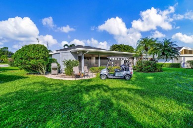 This stunning home boasts a bright and expansive great room with on Eastpointe Country Club in Florida - for sale on GolfHomes.com, golf home, golf lot