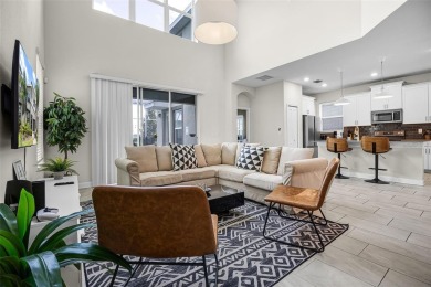 Step into resort-style living at 661 Drop Shot Drive, a on The Oasis Club at Champions Gate in Florida - for sale on GolfHomes.com, golf home, golf lot