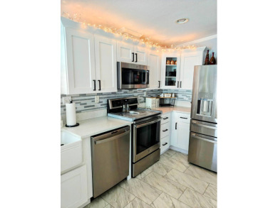 I dare you to take a look at this Palm Harbor 1,512' sq ft, 2 on Southport Springs Golf Club in Florida - for sale on GolfHomes.com, golf home, golf lot