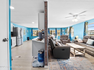 Welcome to your dream home in Barefoot Bay! This spacious on Barefoot Bay Golf Course in Florida - for sale on GolfHomes.com, golf home, golf lot