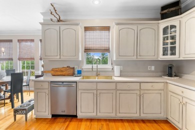Full of charm and nestled in a quiet cul-de-sac, this 4-bedroom on West Lake Country Club in Georgia - for sale on GolfHomes.com, golf home, golf lot
