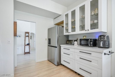 This exquisite home is perfect for those who adore both indoor & on Highland Falls Golf Club in Nevada - for sale on GolfHomes.com, golf home, golf lot