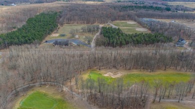 This fantastic wooded golf course lot with access to Houghton on Quest Golf Club in Michigan - for sale on GolfHomes.com, golf home, golf lot