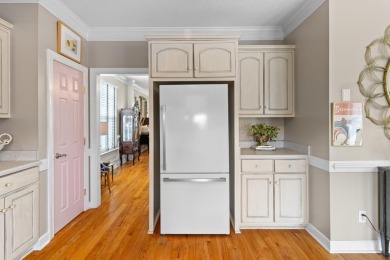 Full of charm and nestled in a quiet cul-de-sac, this 4-bedroom on West Lake Country Club in Georgia - for sale on GolfHomes.com, golf home, golf lot