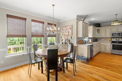 Full of charm and nestled in a quiet cul-de-sac, this 4-bedroom on West Lake Country Club in Georgia - for sale on GolfHomes.com, golf home, golf lot