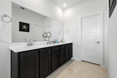 Welcome Home to this stunning 2024-built townhome located in the on Hurricane Creek Country Club in Texas - for sale on GolfHomes.com, golf home, golf lot