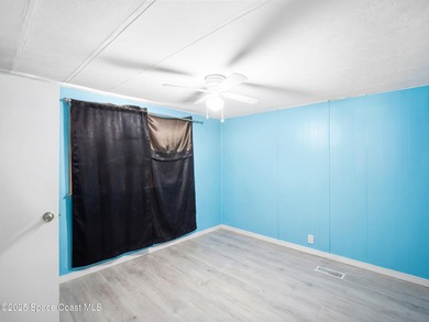 Welcome to your dream home in Barefoot Bay! This spacious on Barefoot Bay Golf Course in Florida - for sale on GolfHomes.com, golf home, golf lot