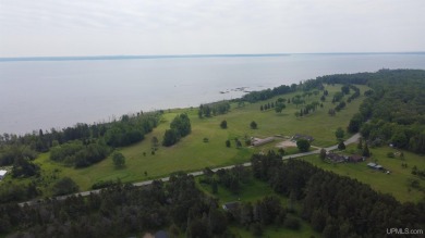 Beautiful 9 hole golf course on 57 acres with 2000 feet of on Nahma Club in Michigan - for sale on GolfHomes.com, golf home, golf lot