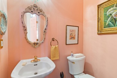 Full of charm and nestled in a quiet cul-de-sac, this 4-bedroom on West Lake Country Club in Georgia - for sale on GolfHomes.com, golf home, golf lot